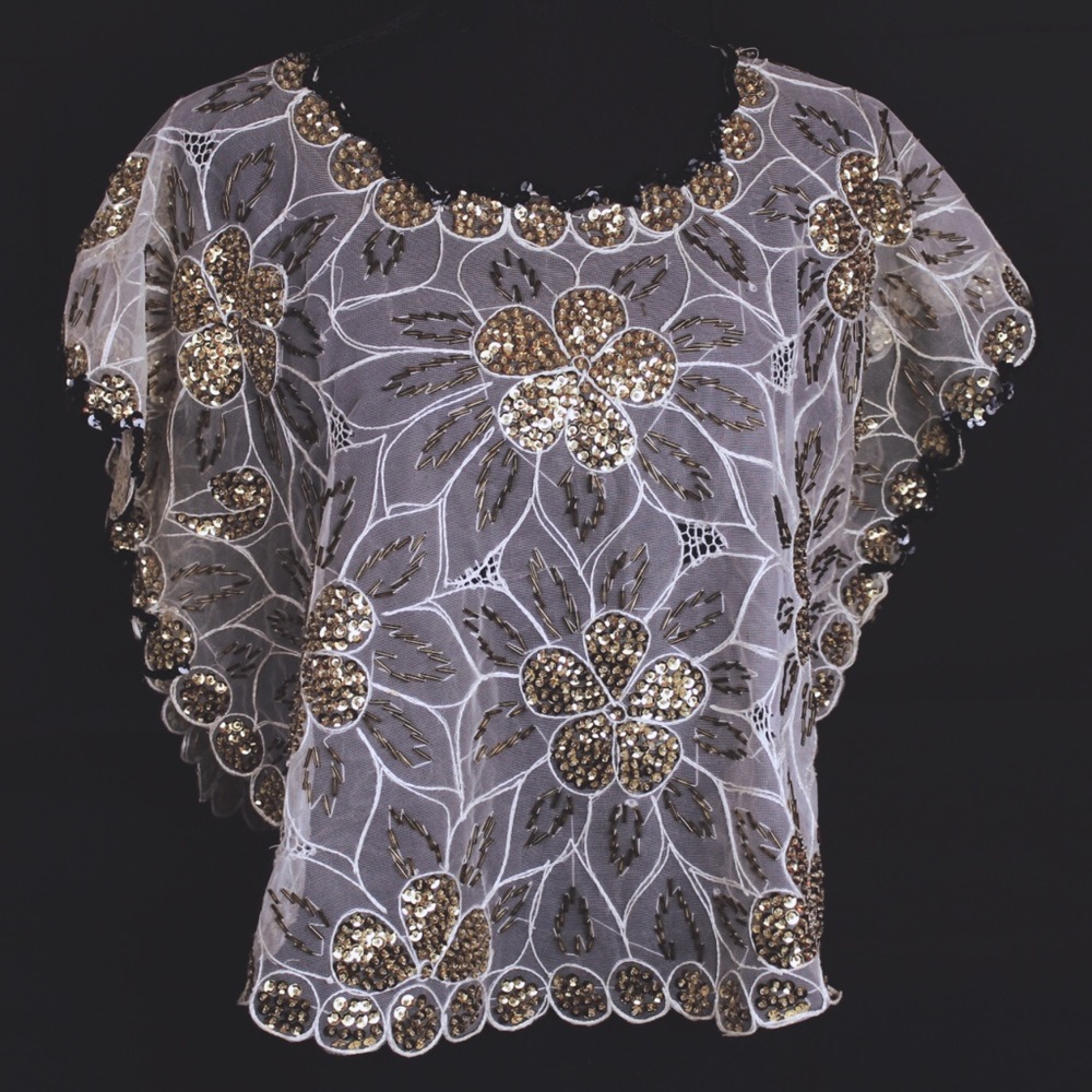 sheer gold sequin top with gold sequin floral design